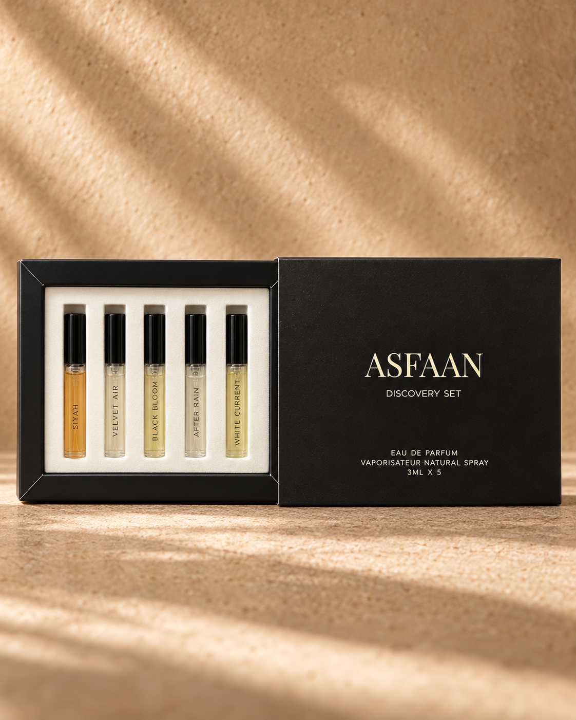 ASFAAN Discovery Set sliding sleeve opened sideways, revealing five 3 ml Eau de Parfum vials in white insert